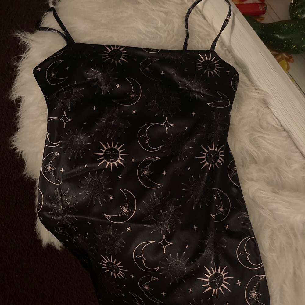 This is a sun & moon black mini dress many sizes available